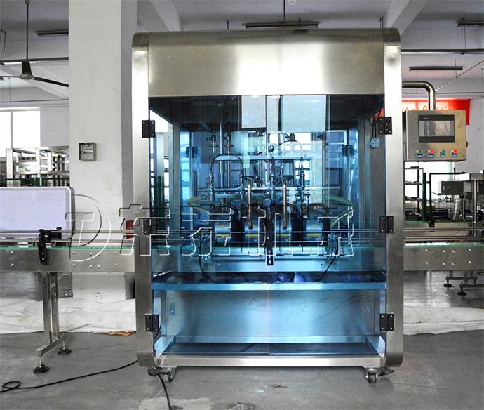 全自動油類灌裝機(jī).jpg 全自動油類灌裝機(jī).jpg